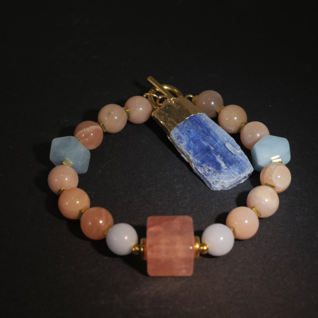Sharded Beauty: Picasso Inspired Rhodochrosite & Aquamarine Bracelet——A fractured palette for revolution and positivity.