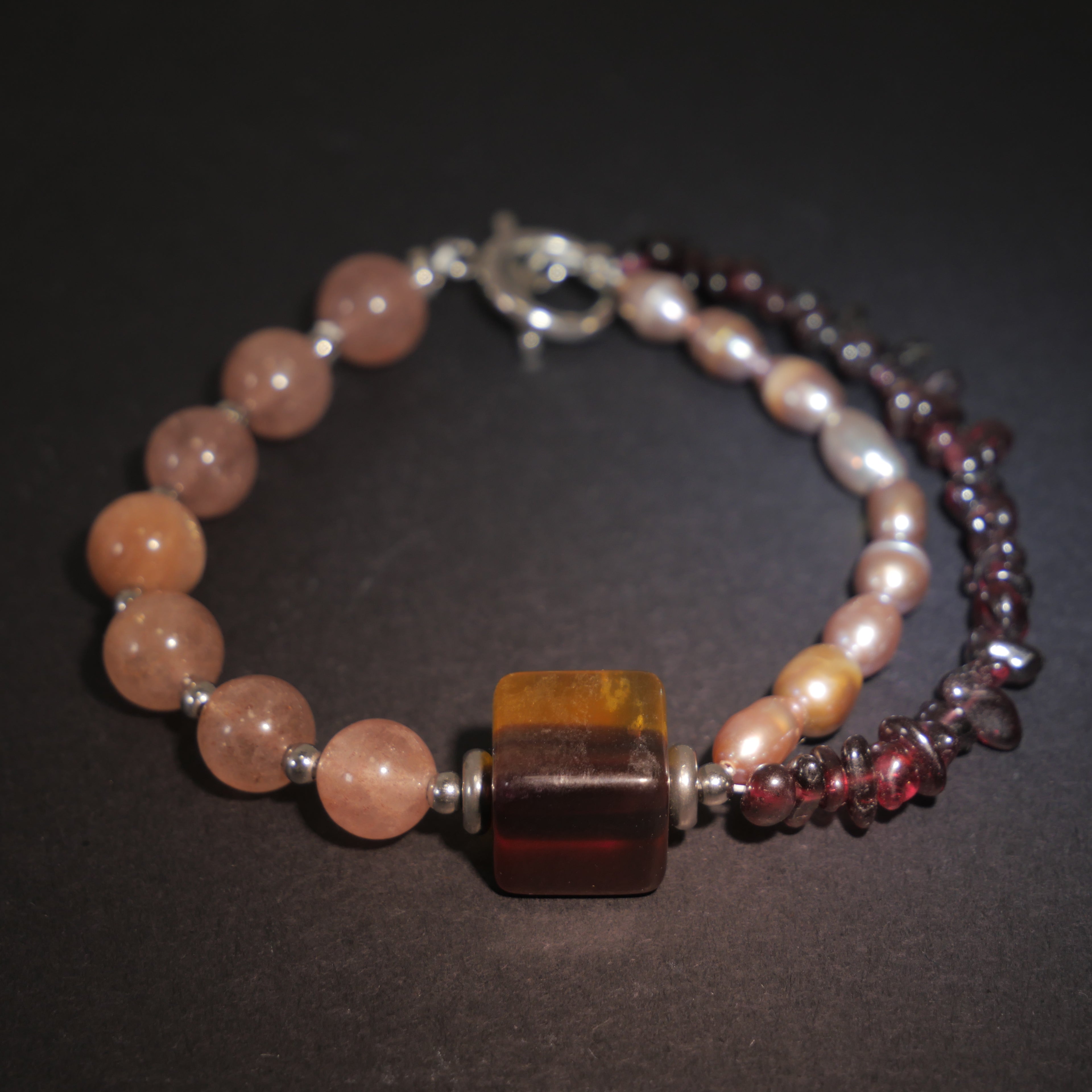 Deep Vision: O'Keeffe Inspired Fluorite & Strawberry Quartz Bracelet——A velvety palette for strength and intuition.