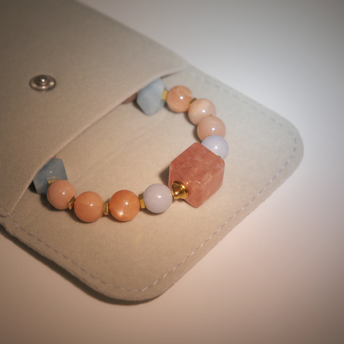 Sharded Beauty: Picasso Inspired Rhodochrosite & Aquamarine Bracelet——A fractured palette for revolution and positivity.
