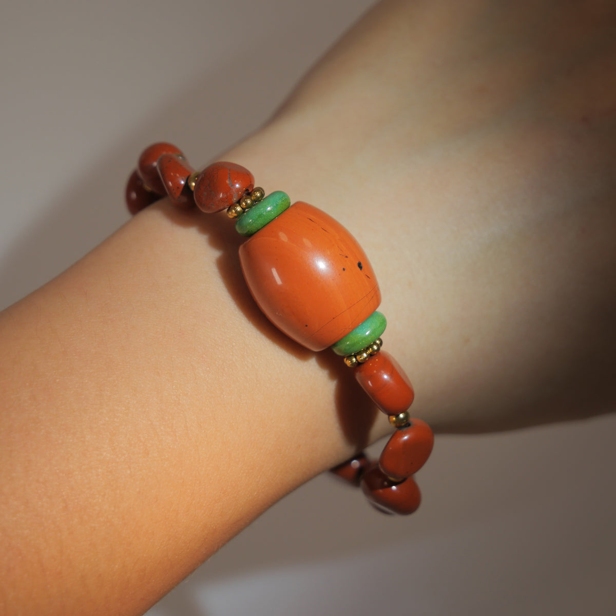 Radiant Flame: O'Keeffe Inspired Red Jasper & Malachite Bracelet——A fiery palette for vitality and passion