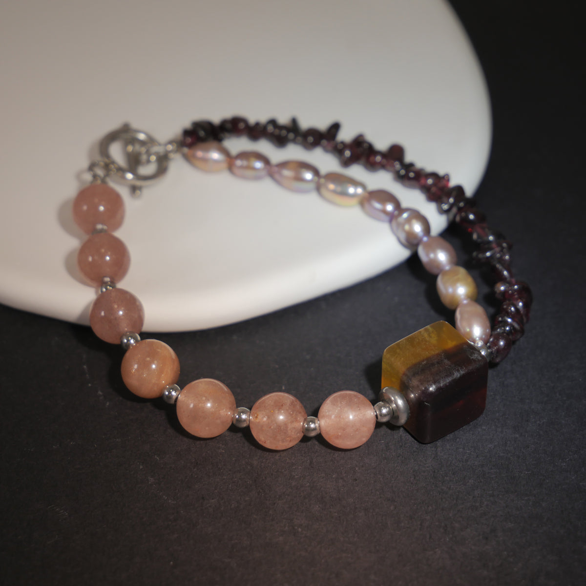 Deep Vision: O'Keeffe Inspired Fluorite & Strawberry Quartz Bracelet——A velvety palette for strength and intuition.