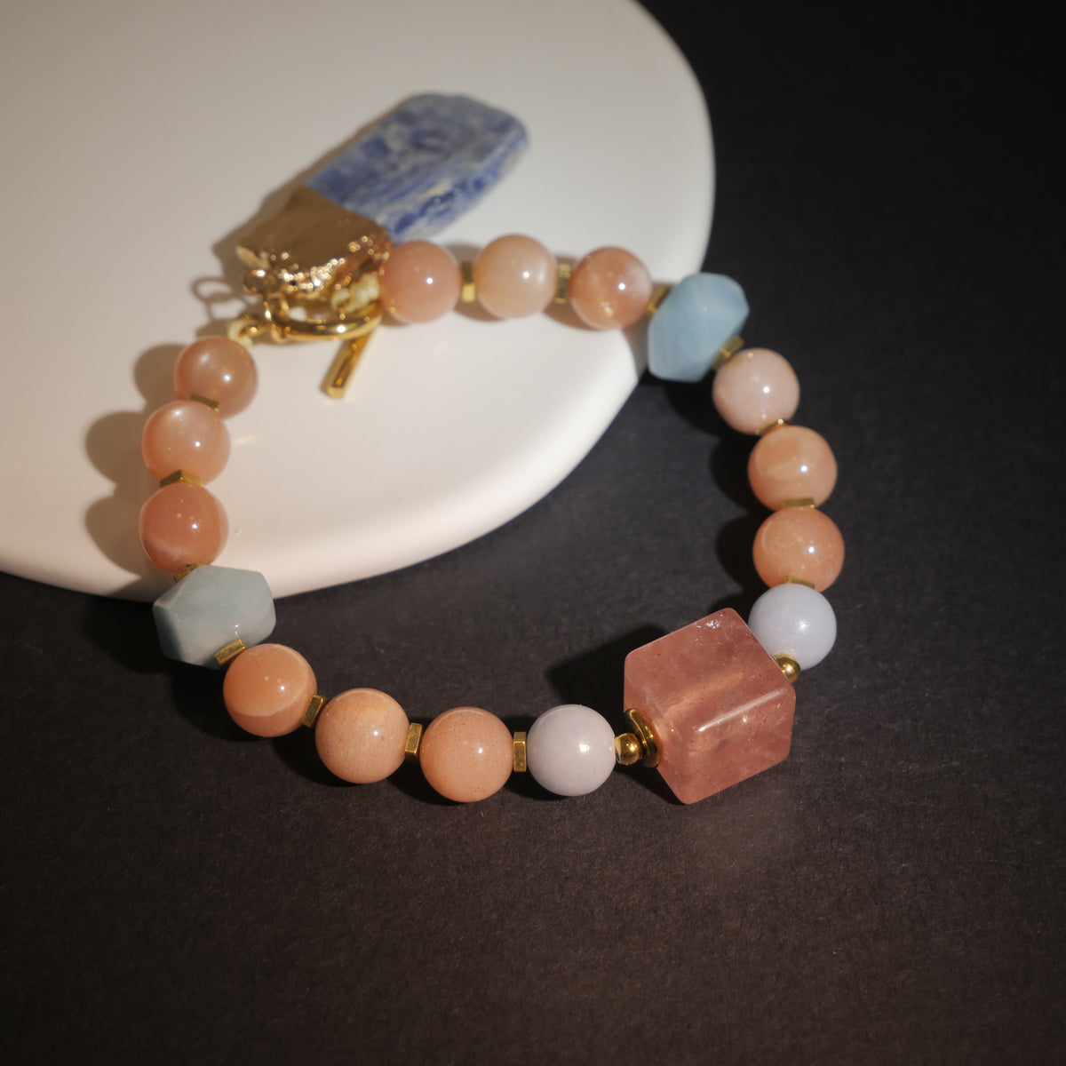 Sharded Beauty: Picasso Inspired Rhodochrosite & Aquamarine Bracelet——A fractured palette for revolution and positivity.